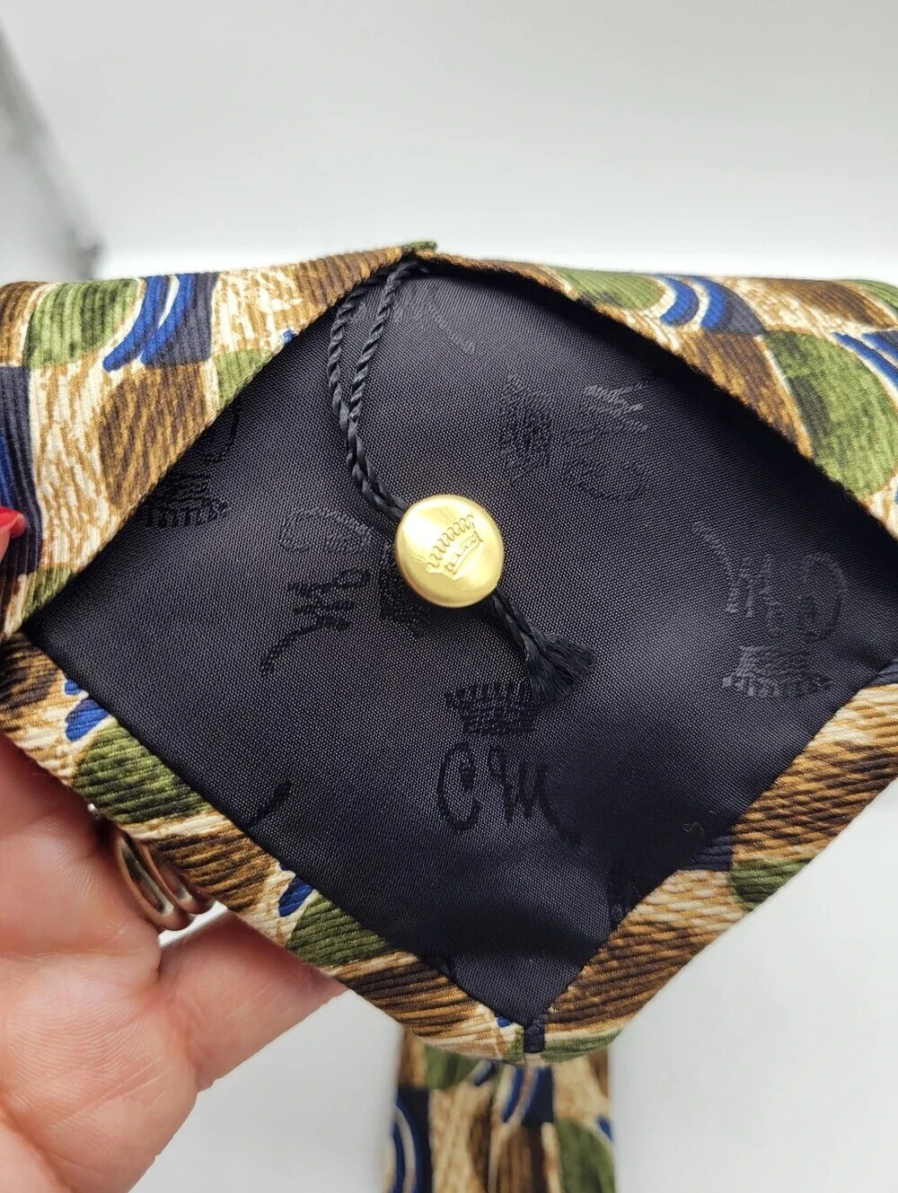 Vintage Countess Mara all silk Neck Tie featuring a Geometric Pattern green Blue
